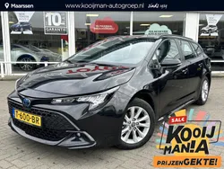 Zwart Gebruikt 2023 Toyota Corolla Hybrid Active Stationwagen | € 28.900