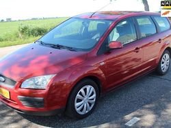 Oranje Gebruikt 2007 Ford Focus Trend Stationwagen | € 1.999 (Eerlijke prijs)