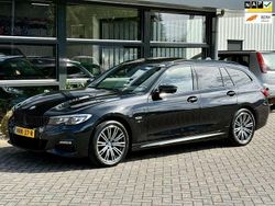 Zwart Gebruikt 2022 BMW 330e Executive Stationwagen | € 29.995 (Goede deal)