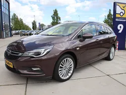 Bruin, metallic lak Gebruikt 2016 Opel Astra Innovation Stationwagen | € 10.946 (Eerlijke prijs)