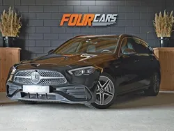 Zwart, metallic lak Gebruikt 2021 Mercedes C200 AMG line Stationwagen | € 42.250 (Eerlijke prijs)