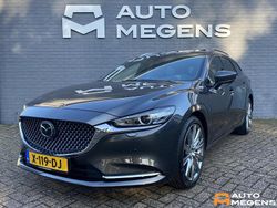 Machine gray mica (donker grijs mica) Gebruikt 2022 Mazda 6 Luxury Stationwagen | € 41.900