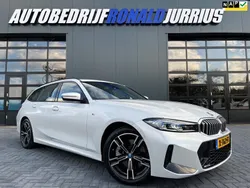 Wit Gebruikt 2023 BMW 320e M Sport Stationwagen | € 39.900 (Eerlijke prijs)