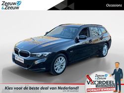 Zwart (metallic) Gebruikt 2023 BMW 320e Stationwagen | € 31.440 (Goede deal)