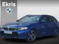Blauw Gebruikt 2024 BMW 320e M Sport Stationwagen | € 42.950 (Goede deal)