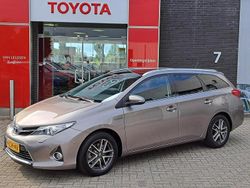 Bruin Gebruikt 2015 Toyota Auris Hybrid Stationwagen | € 13.900 (Eerlijke prijs)