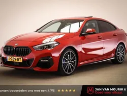 Rood, metallic lak Gebruikt 2021 BMW 218 Executive Coupé | € 30.800 (Iets duurder)