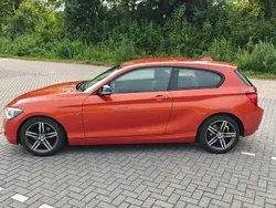 Oranje Gebruikt 2013 BMW 116 Executive Hatchback | € 5.950 (Goede deal)