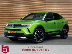 Groen, metallic lak Gebruikt 2021 Opel Mokka-e Elegance SUV | € 16.800 (Eerlijke prijs)