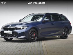 Blauw Gebruikt 2023 BMW 330e Executive Stationwagen | € 43.900