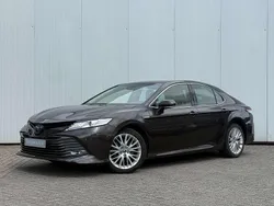 Bruin, metallic lak Gebruikt 2019 Toyota Camry Executive Sedan | € 25.945 (Goede deal)