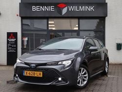 Grijs Gebruikt 2023 Toyota Corolla Hybrid Active Stationwagen | € 24.895 (Goede deal)