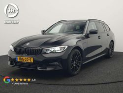 Zwart (metallic) Gebruikt 2021 BMW 330e Sport Line Stationwagen | € 28.420 (Goede deal)