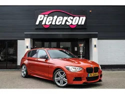 Oranje, metallic lak Gebruikt 2014 BMW 125 M Sport Hatchback | € 12.950