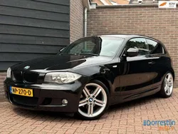 Zwart, metallic lak Gebruikt 2010 BMW 116 Executive Hatchback | € 5.450 (Eerlijke prijs)