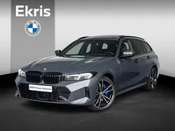 Grijs, metallic lak Gebruikt 2024 BMW 330e M Sport Stationwagen | € 58.695 (Eerlijke prijs)