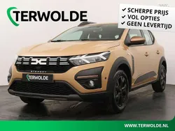 Bruin, metallic lak Gebruikt 2024 Dacia Sandero Journey Hatchback | € 22.945 (Eerlijke prijs)