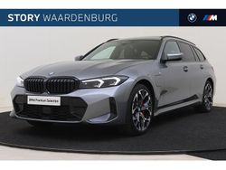 Grijs Gebruikt 2024 BMW 330e Executive Stationwagen | € 57.650 (Duur)
