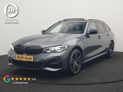 Grijs Gebruikt 2021 BMW 330e M Sport Stationwagen | € 34.430 (Eerlijke prijs)