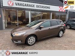 Bruin (metallic) Gebruikt 2018 Ford Focus Stationwagen | € 11.950 (Eerlijke prijs)