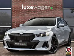 Grijs Gebruikt 2024 BMW 520 M Sport Stationwagen | € 64.900 (Goede deal)