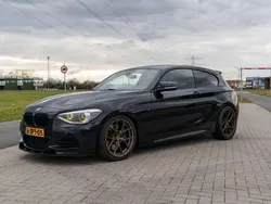 Zwart Gebruikt 2013 BMW M135 Hatchback | € 20.990