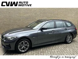 Grijs Gebruikt 2021 BMW 320e Basis Stationwagen | € 24.900 (Goede deal)