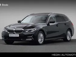 Zwart Gebruikt 2022 BMW 320 Executive Stationwagen | € 35.880 (Eerlijke prijs)