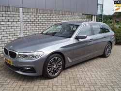 Grijs, metallic lak Gebruikt 2020 BMW 520 Executive Stationwagen | € 34.450 (Goede deal)