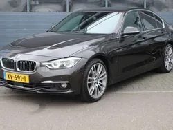 Bruin, metallic lak Gebruikt 2016 BMW 330 Executive Sedan | € 15.799 (Goede deal)