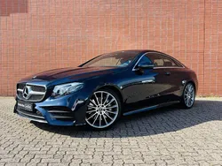 Blauw, metallic lak Gebruikt 2020 Mercedes E350 AMG line Coupé | € 42.900 (Super prijs)