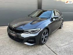 Grijs Gebruikt 2021 BMW 330 Executive Stationwagen | € 26.999 (Goede deal)