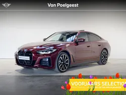 Rood, metallic lak Gebruikt 2024 BMW i4 Executive Sedan | € 48.900 (Goede deal)