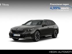 Grijs Nieuw 2025 BMW 550e M Sport Stationwagen | € 111.851 (Goede deal)