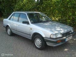 Grijs Gebruikt 1988 Mazda 323 Sedan | € 1.475