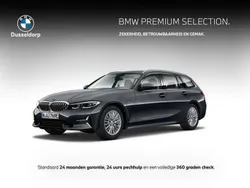 Grijs, metallic lak Gebruikt 2020 BMW 330e Luxury Line Stationwagen | € 27.950 (Goede deal)
