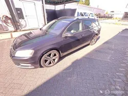 Zwart Gebruikt 2013 VW Passat R-line BlueMotion Stationwagen | € 5.599 (Goede deal)