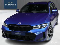 Blauw, metallic lak Gebruikt 2022 BMW 330e M Sport Stationwagen | € 44.900 (Eerlijke prijs)