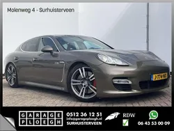 Bruin, metallic lak Gebruikt 2011 Porsche Panamera Turbo Sedan | € 18.900