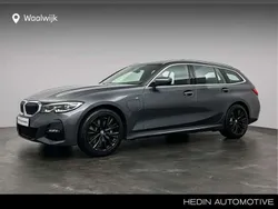 Grijs, metallic lak Gebruikt 2021 BMW 330 Executive Stationwagen | € 35.880 (Iets duurder)