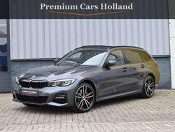 Grijs Gebruikt 2022 BMW 330e M Sport Stationwagen | € 36.950 (Goede deal)