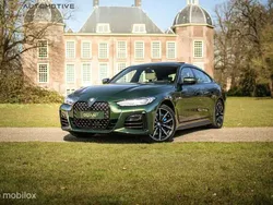 Groen, metallic lak Gebruikt 2021 BMW 430 Gran Coupé M Sport Coupé | € 39.999 (Goede deal)