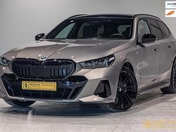 Grijs Gebruikt 2024 BMW 520 M Sport Stationwagen | € 61.950 (Eerlijke prijs)