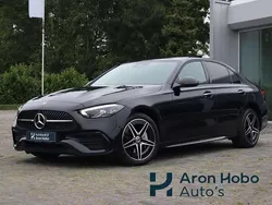 Zwart Gebruikt 2023 Mercedes C300e AMG line Sedan | € 43.950 (Goede deal)