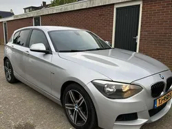 Grijs Gebruikt 2012 BMW 118 Sport Line Hatchback | € 7.500