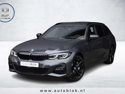 Grijs Gebruikt 2022 BMW 330e Executive Stationwagen | € 33.945 (Goede deal)