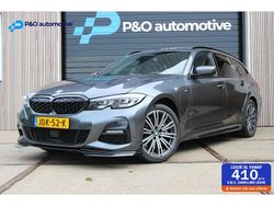 Grijs Gebruikt 2021 BMW 330 M Sport Stationwagen | € 30.995 (Eerlijke prijs)