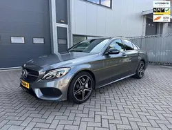 Grijs, metallic lak Gebruikt 2018 Mercedes C180 AMG Sedan | € 24.750 (Eerlijke prijs)