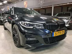 Zwart, metallic lak Gebruikt 2021 BMW 330e Executive Stationwagen | € 36.849 (Eerlijke prijs)