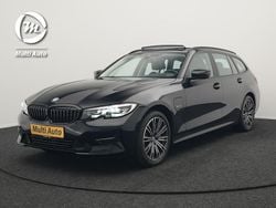 Zwart Gebruikt 2022 BMW 330e Sport Line Stationwagen | € 29.440 (Goede deal)